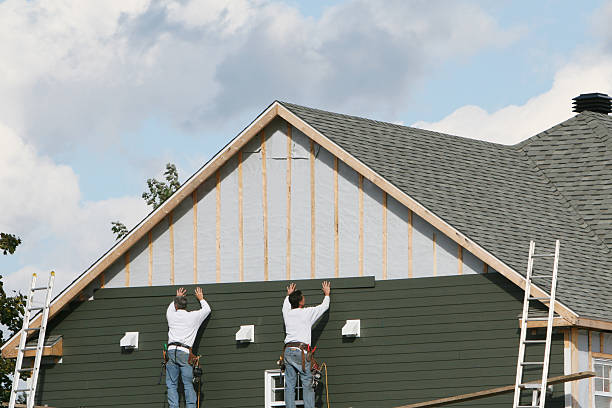Professional Siding Repair technician working in Manor, PA